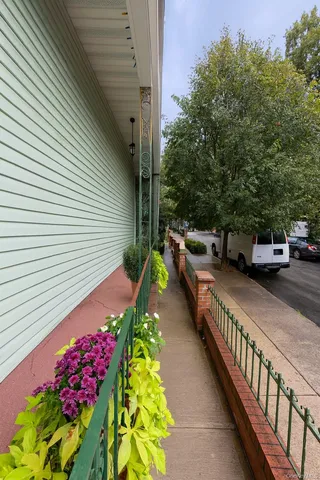 a view of a porch with furniture