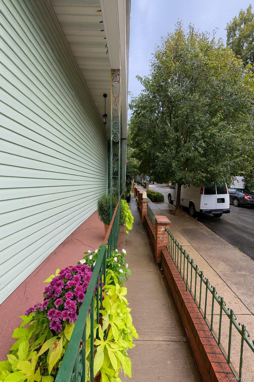 85-52 79th Street Queens, NY 11421 - Photo 8 of 11 a view of a porch with furniture