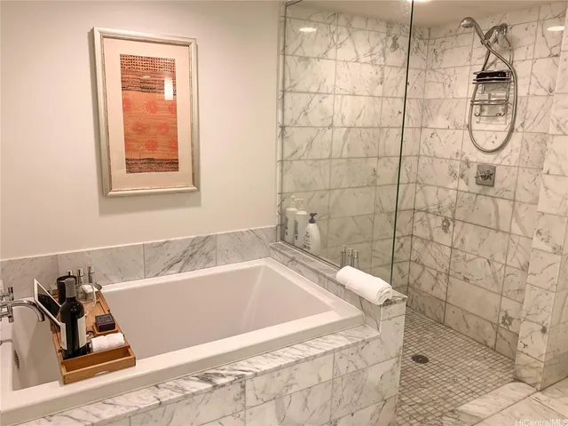 a bathroom with a bath tub