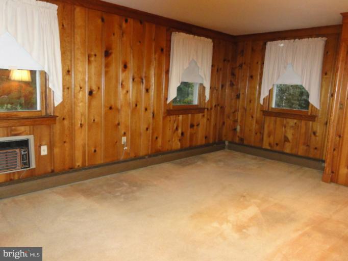 104 Sycamore Road Linthicum, MD 21090 - Photo 10 of 13 a view of an empty room with a window