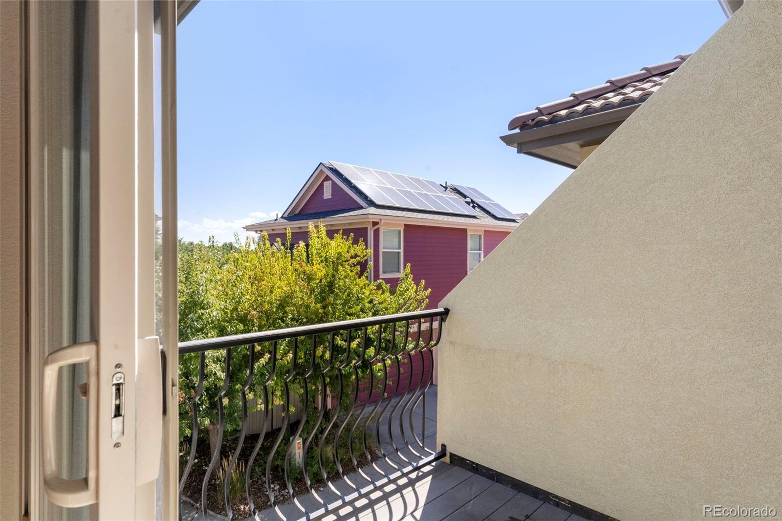 2222 Valentia Street Denver, CO 80238 - Photo 11 of 26 a view of a balcony with a yard