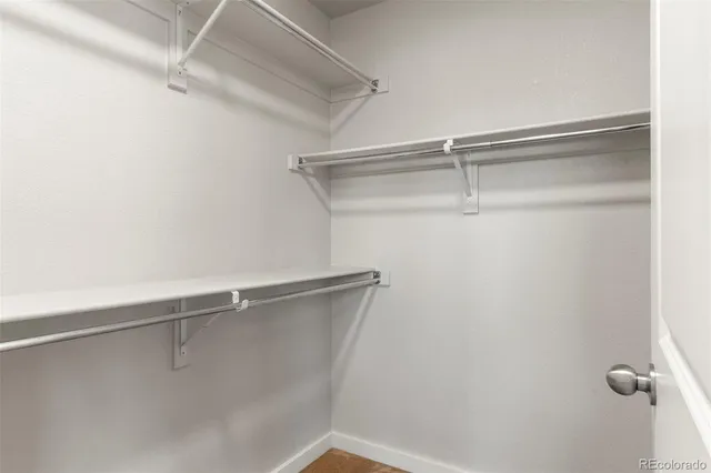 a view of a room with racks on the wall