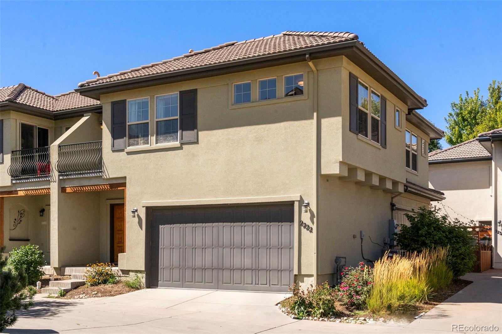 2222 Valentia Street Denver, CO 80238 - Photo 21 of 26 a front view of a house with a yard