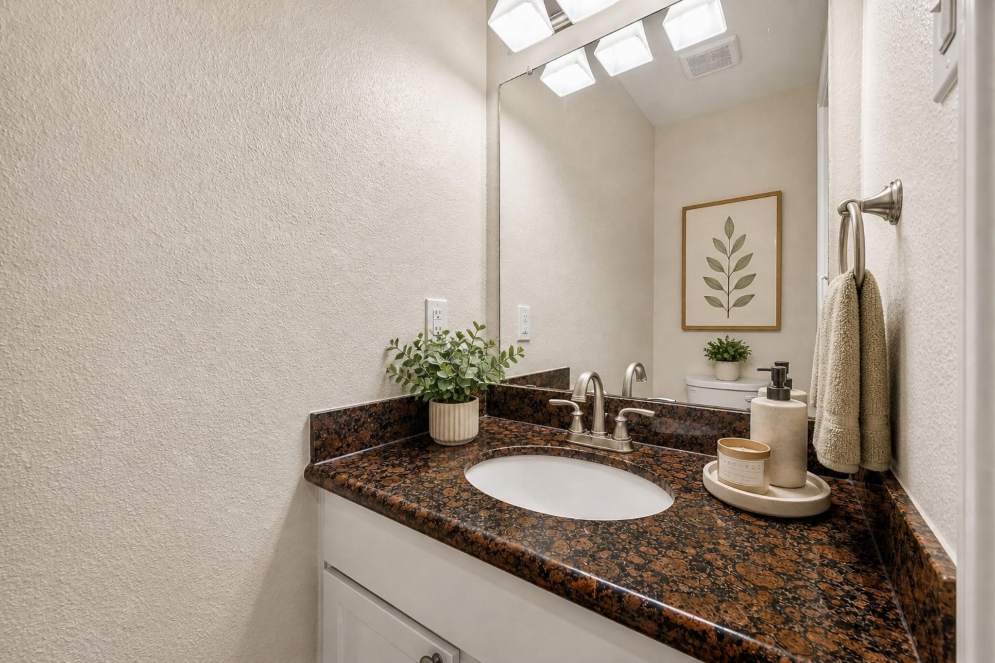 2211 South Kirkwood Road, Unit 68 Houston, TX 77077 - Photo 10 of 14 “Stylish powder bath featuring granite countertops, modern fixtures, and a clean, updated look—perfect for guests.”