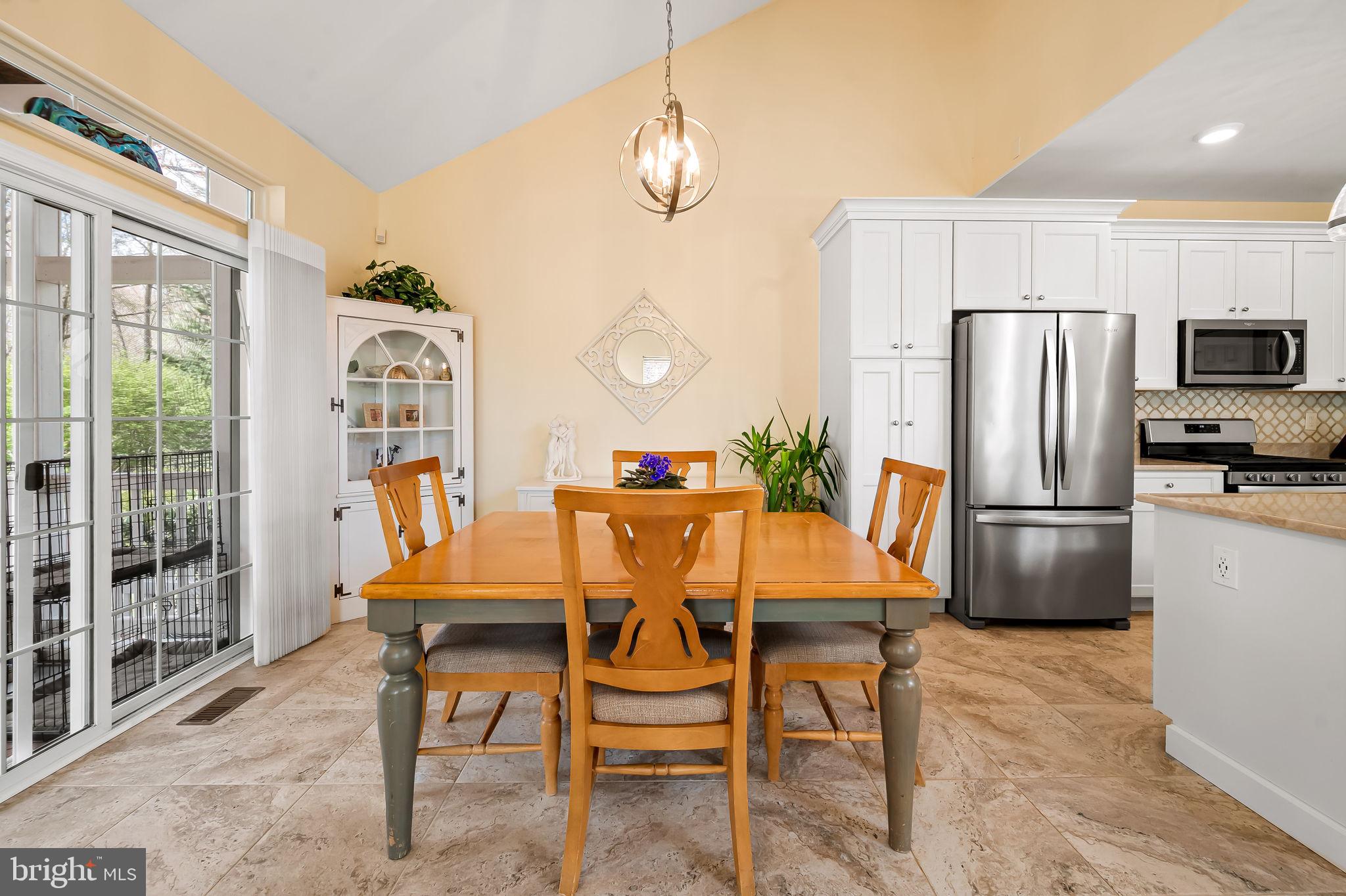 2015 Colgate Circle Forest Hill, MD 21050 - Photo 11 of 50 a dining room with furniture a large window and stainless steel appliances