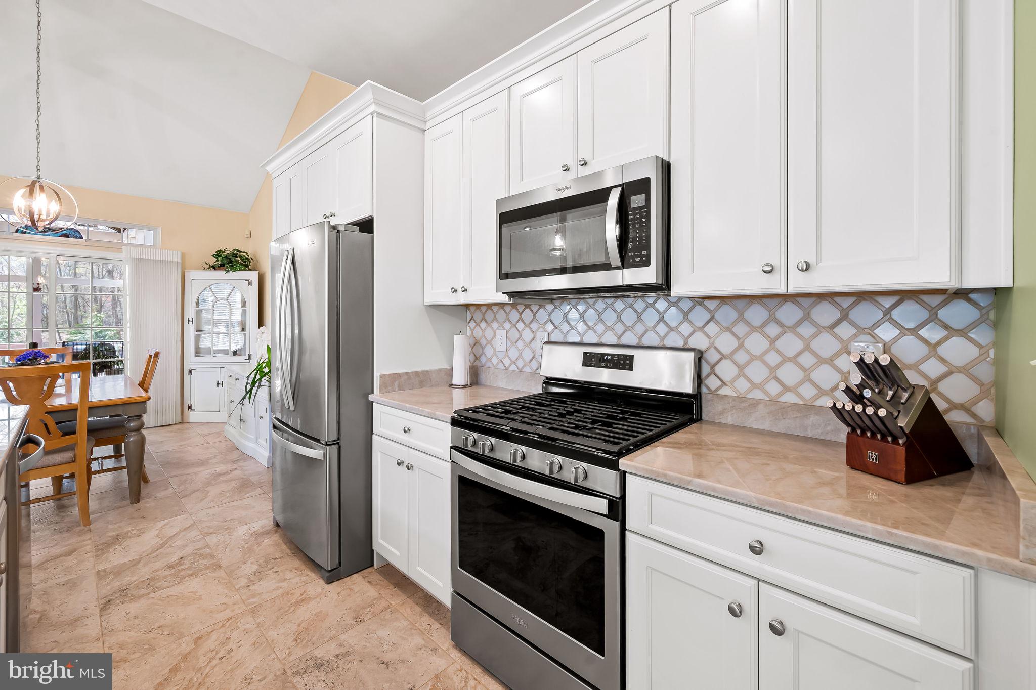 2015 Colgate Circle Forest Hill, MD 21050 - Photo 15 of 50 a kitchen with white cabinets and stainless steel appliances