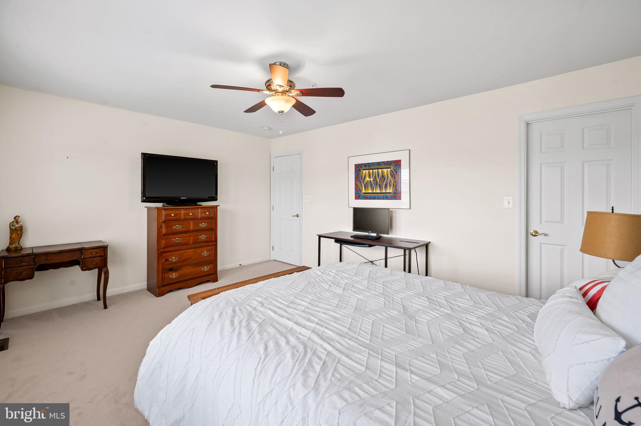 2015 Colgate Circle Forest Hill, MD 21050 - Photo 23 of 50 a bedroom with a bed and a flat screen tv