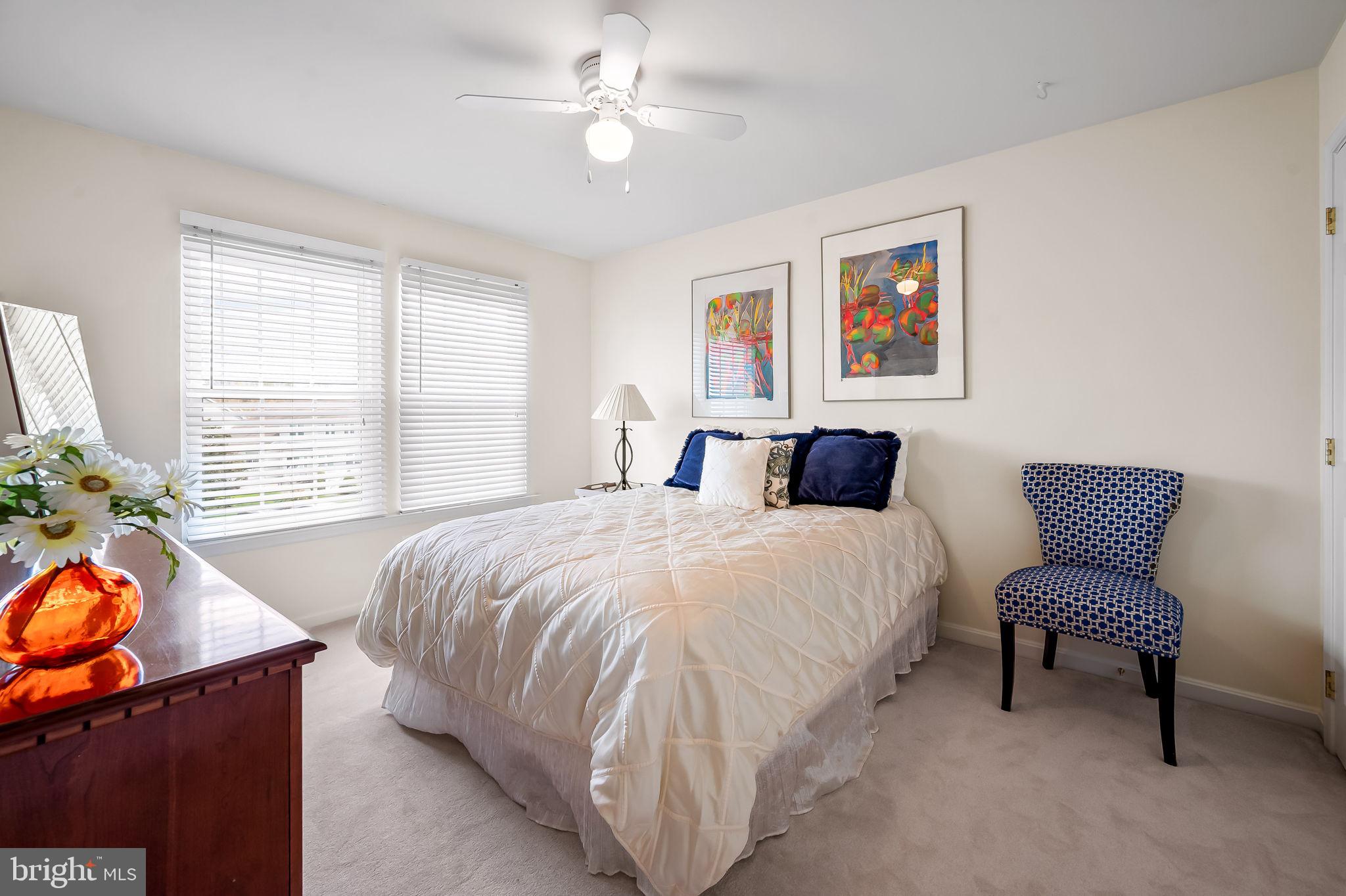2015 Colgate Circle Forest Hill, MD 21050 - Photo 27 of 50 a bedroom with a bed and a chandelier