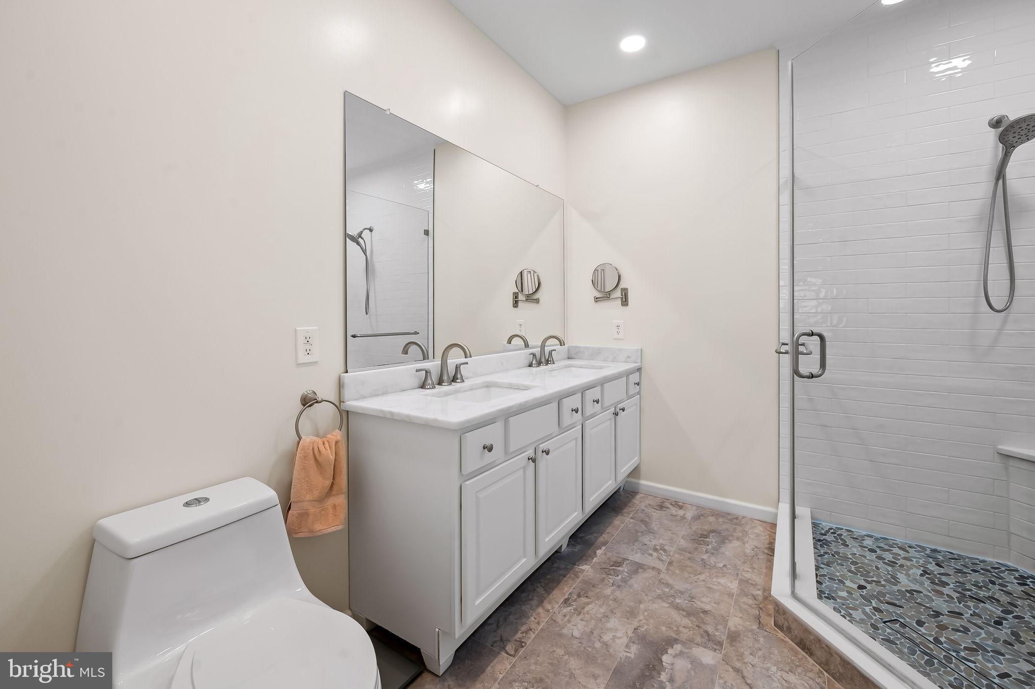 2015 Colgate Circle Forest Hill, MD 21050 - Photo 35 of 50 a bathroom with a double vanity sink toilet and shower