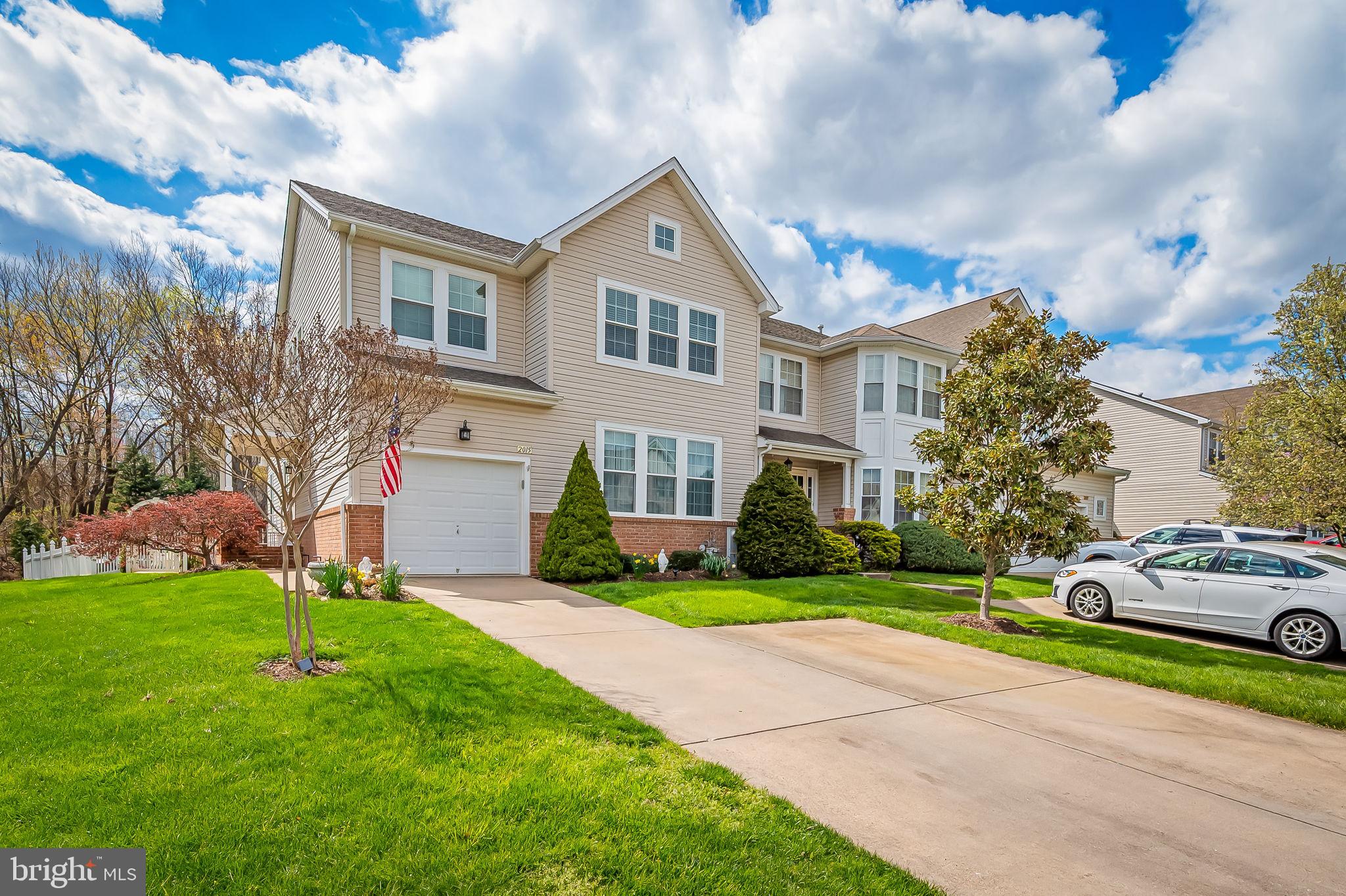 2015 Colgate Circle Forest Hill, MD 21050 - Photo 5 of 50 a front view of a house with a yard and garage