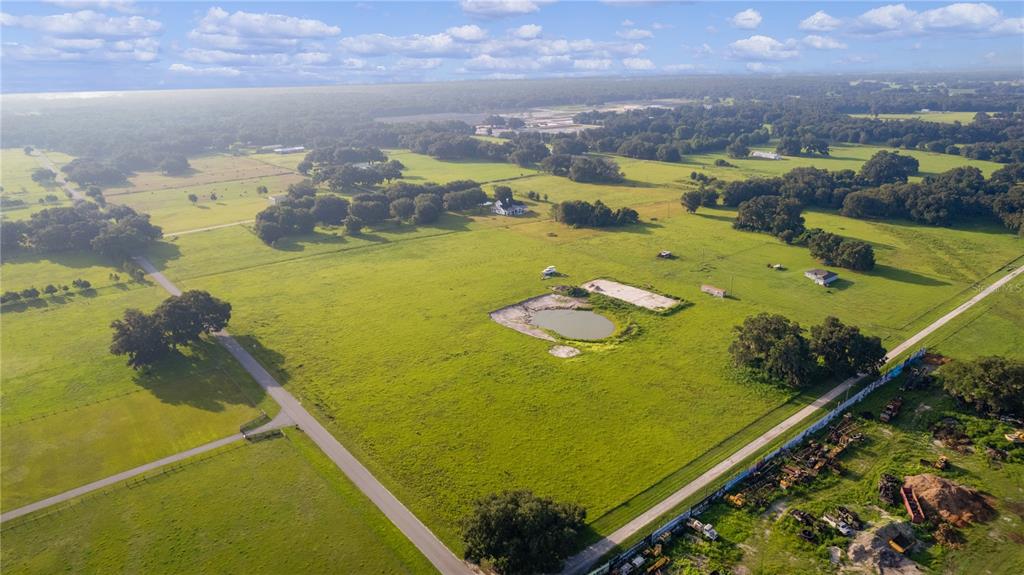2425 Cr 546a Bushnell Bushnell, FL 33513 - Photo 11 of 15 an aerial view of a residential houses with outdoor space