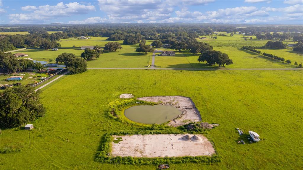2425 Cr 546a Bushnell Bushnell, FL 33513 - Photo 15 of 15 an aerial view of residential houses with outdoor space