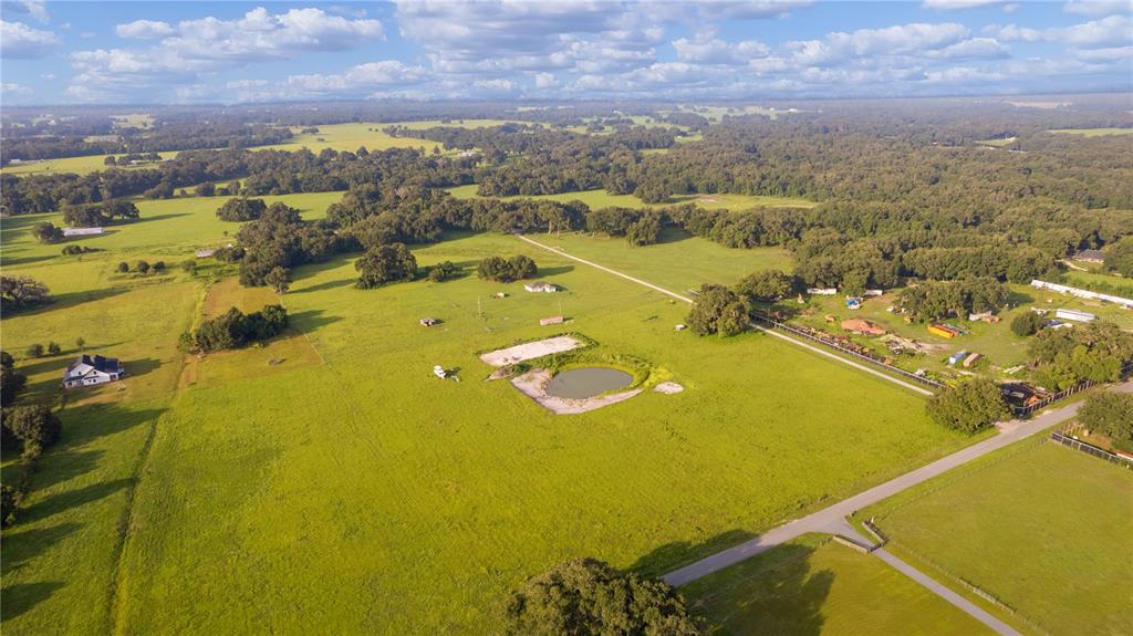 2425 Cr 546a Bushnell Bushnell, FL 33513 - Photo 3 of 15 an aerial view of residential houses with outdoor space