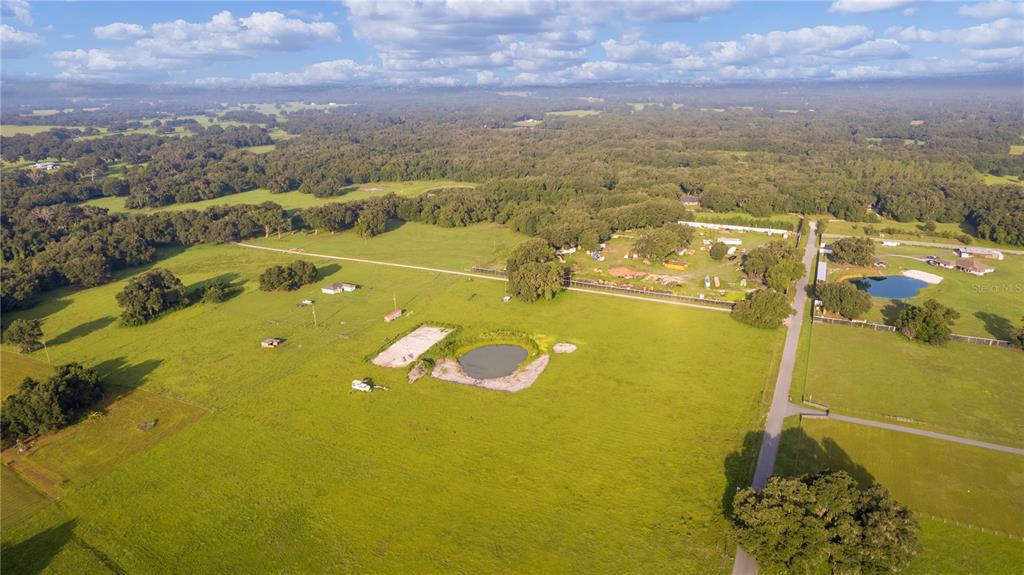 2425 Cr 546a Bushnell Bushnell, FL 33513 - Photo 4 of 15 an aerial view of residential houses with outdoor space