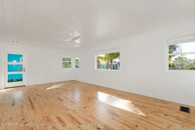 an empty room with windows