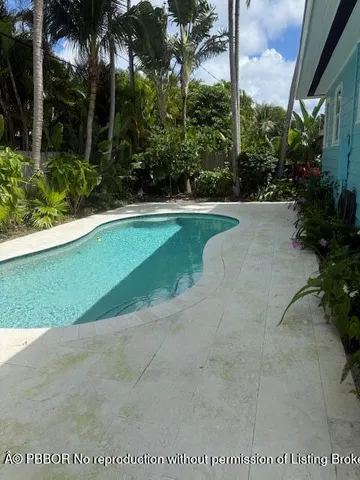 a view of a chairs and table in the patio