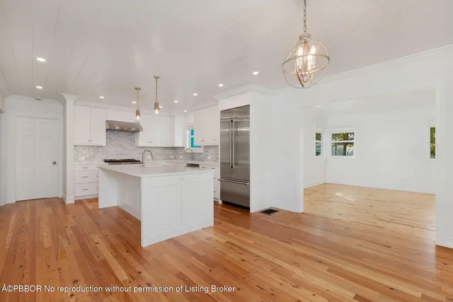 a view of kitchen and sink