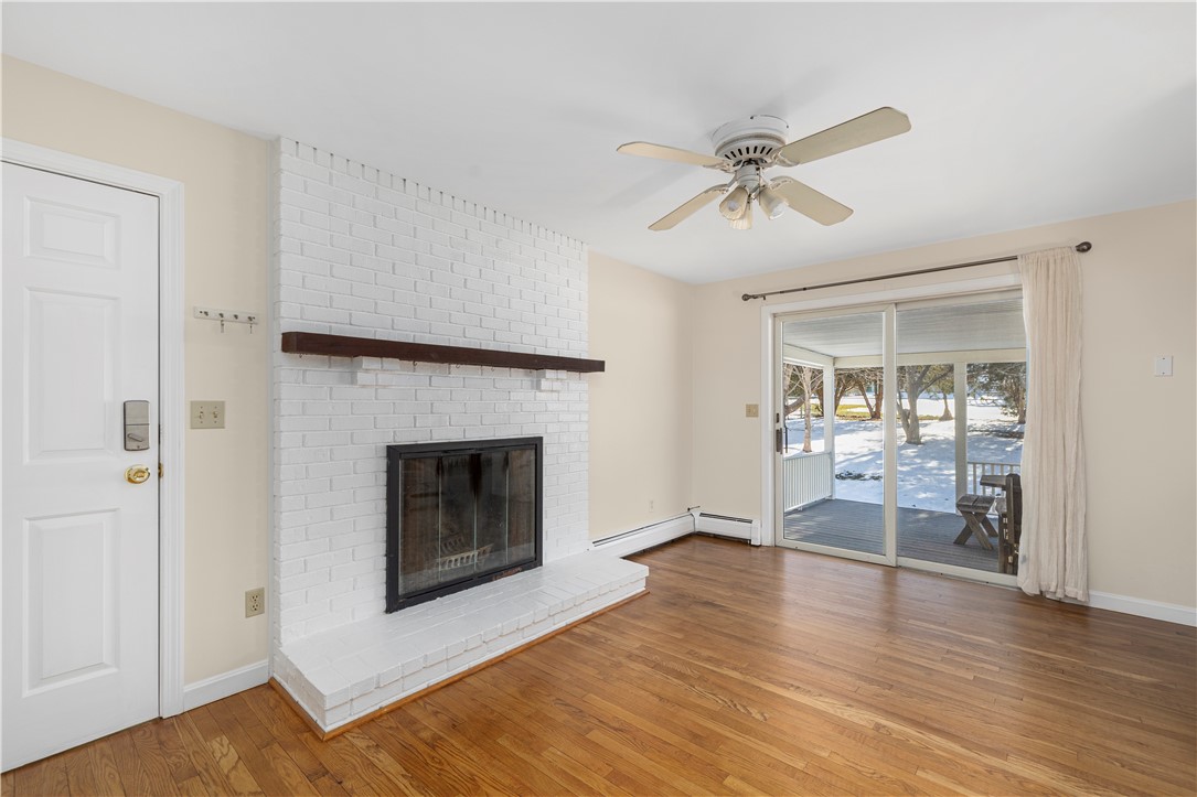 18 Coggeshall Way Middletown, RI 02842 - Photo 2 of 46 Den with Fireplace