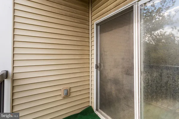 front view of a building with a trees