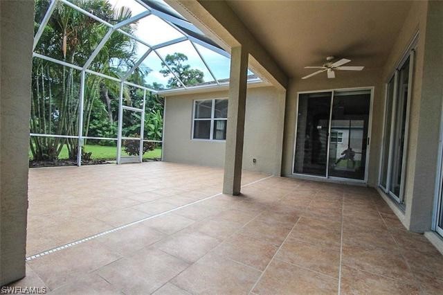 23351 Olde Meadowbrook Circle Estero, FL 34134 - Photo 4 of 25 a view of empty room with floor to ceiling window and floor to ceiling window