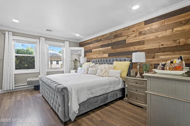 a large white bed in a white room