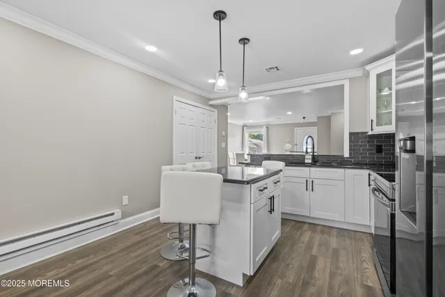 a view of a chairs and table in patio