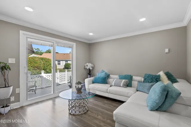 a view of a patio with a chairs and table in a patio