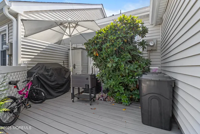 a view of a lake next to a yard