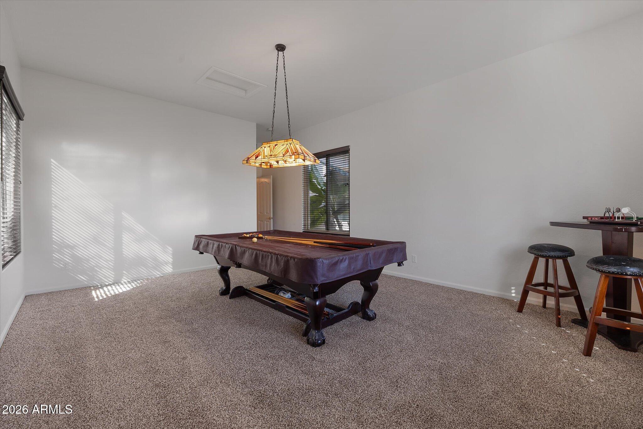 4018 East Harrison Street Gilbert, AZ 85295 - Photo 13 of 45 a room with a table chairs and a window