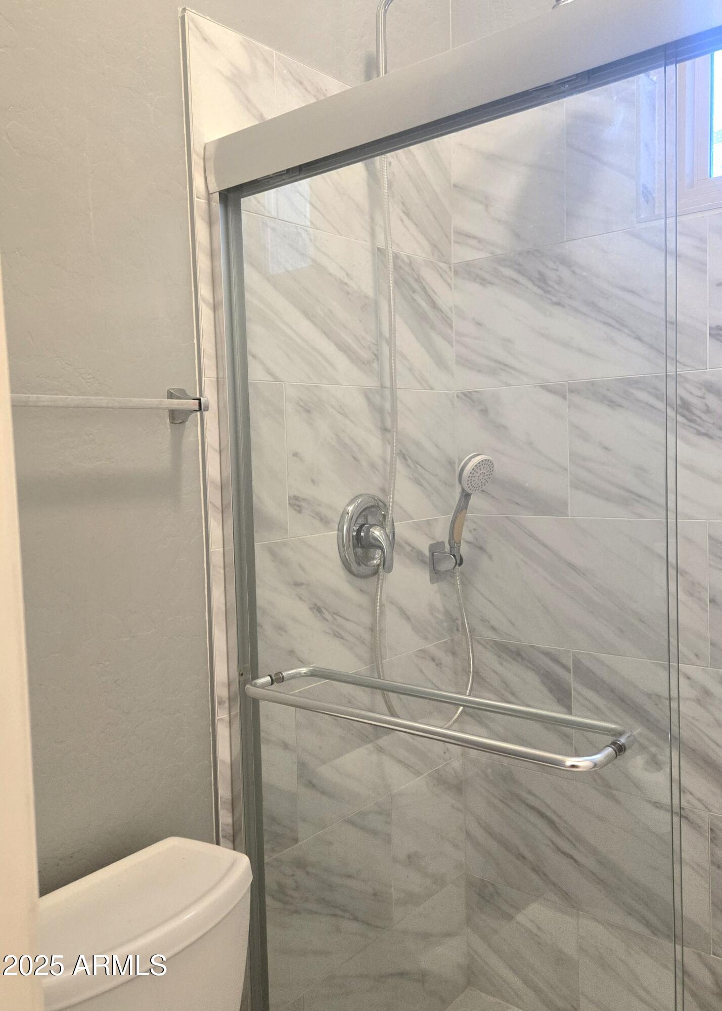 4018 East Harrison Street Gilbert, AZ 85295 - Photo 18 of 45 a bathroom with a shower