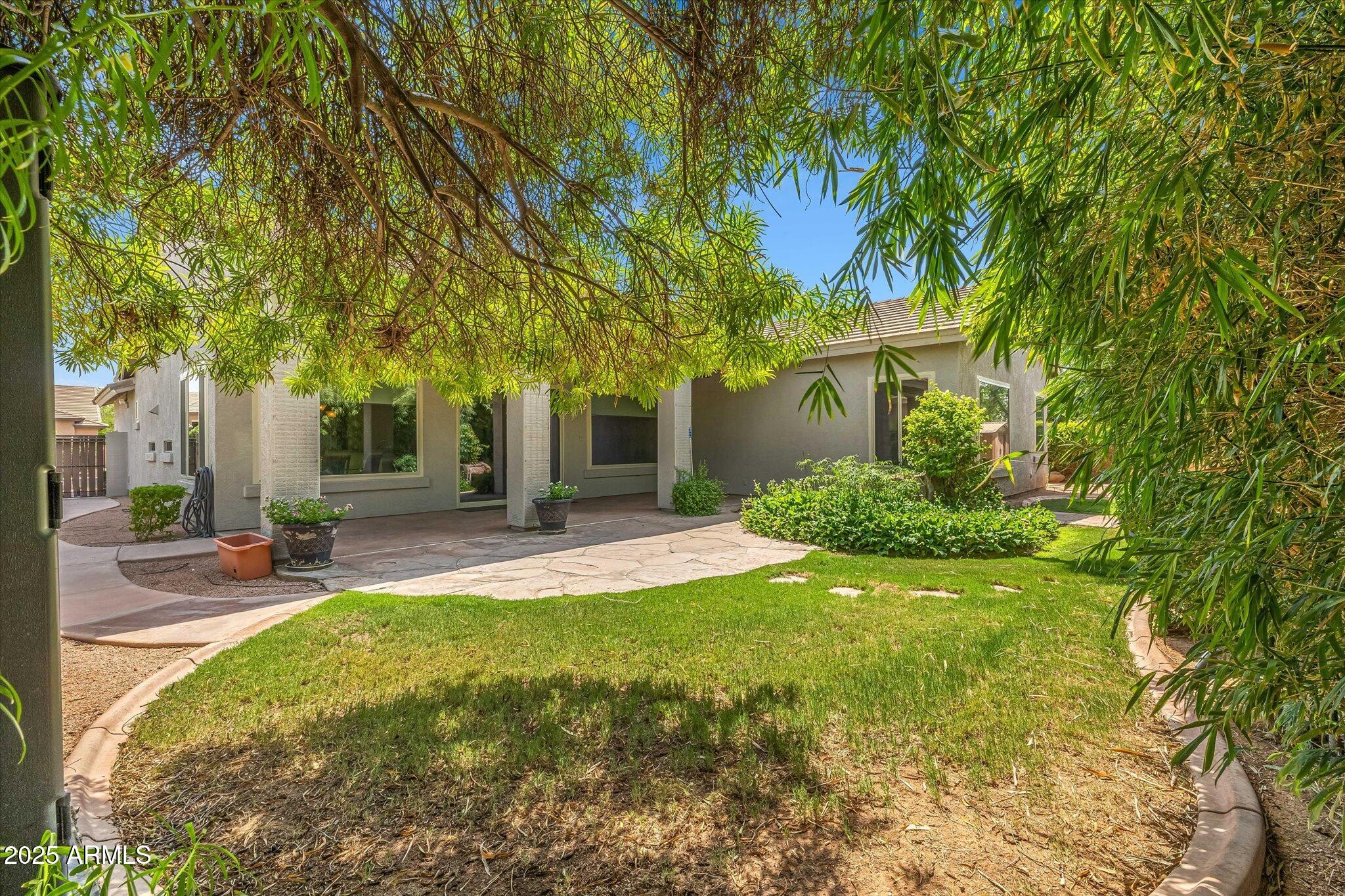 4018 East Harrison Street Gilbert, AZ 85295 - Photo 20 of 45 swimming pool with outdoor seating and yard
