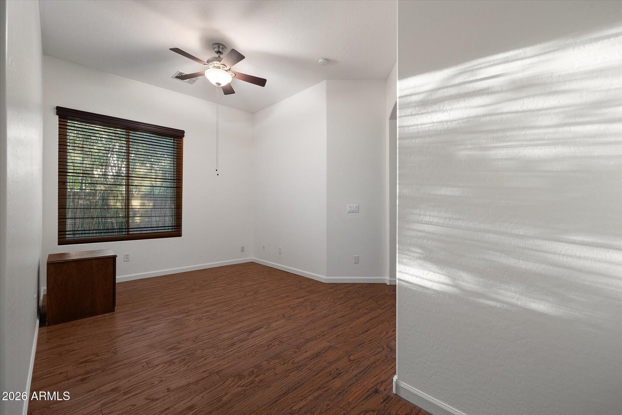4018 East Harrison Street Gilbert, AZ 85295 - Photo 25 of 45 wooden floor in an empty room with a window