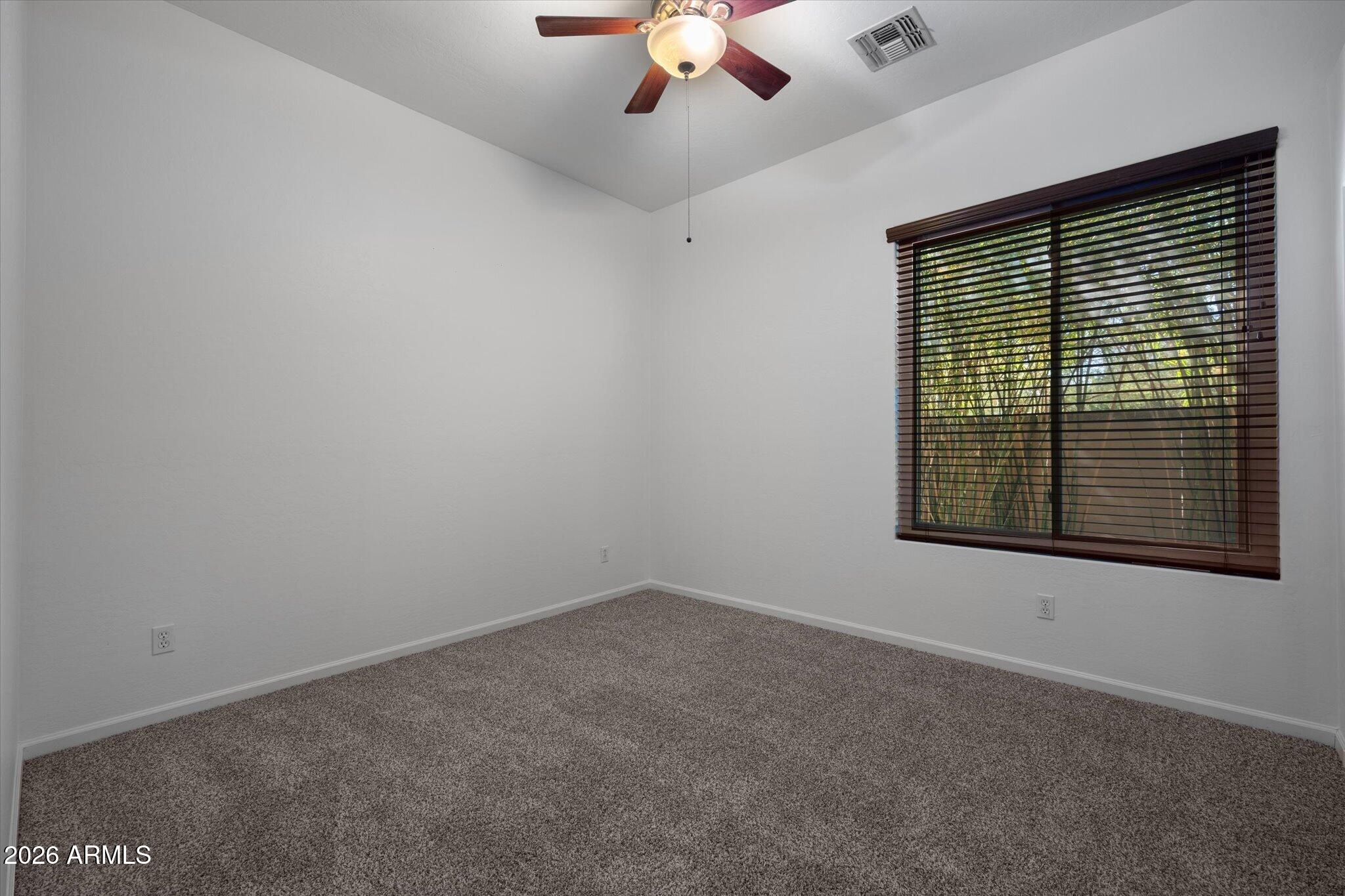 4018 East Harrison Street Gilbert, AZ 85295 - Photo 29 of 45 a view of an empty room with a window
