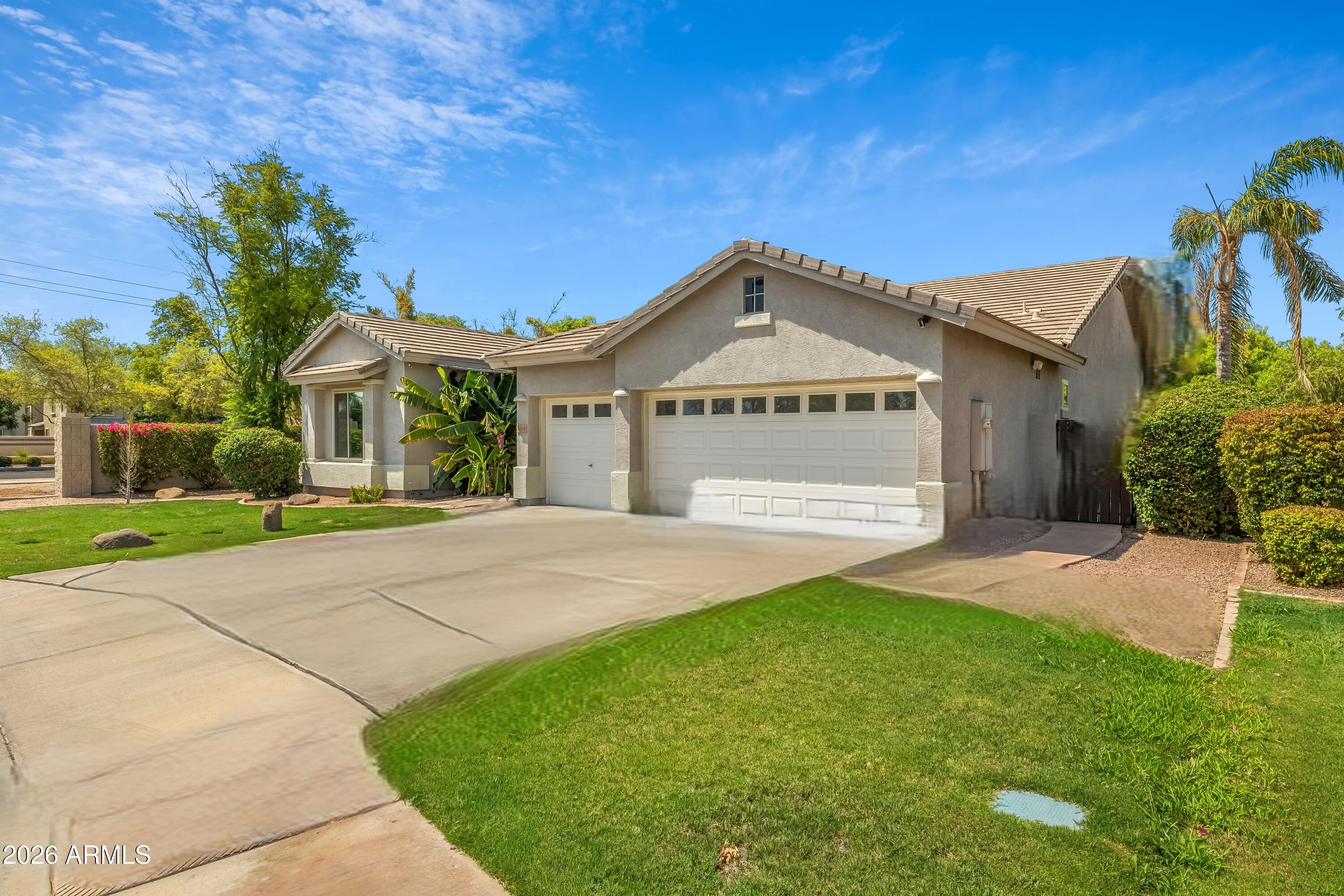 4018 East Harrison Street Gilbert, AZ 85295 - Photo 39 of 45 a front view of a house with a yard