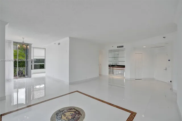 a view of livingroom with furniture and windows