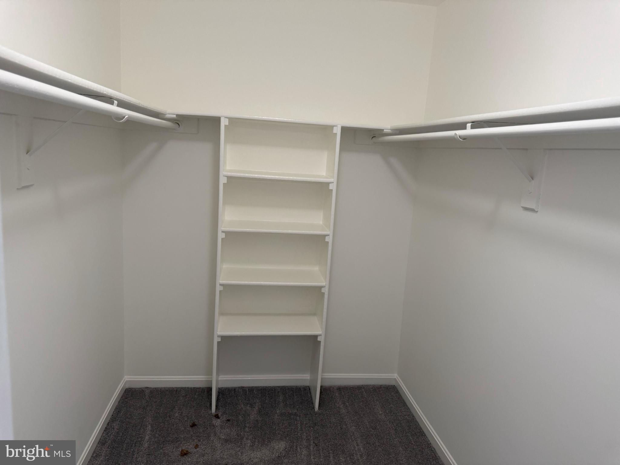 2014 Crosbyside Court Odenton, MD 21113 - Photo 12 of 21 a view of walk in closet with empty racks