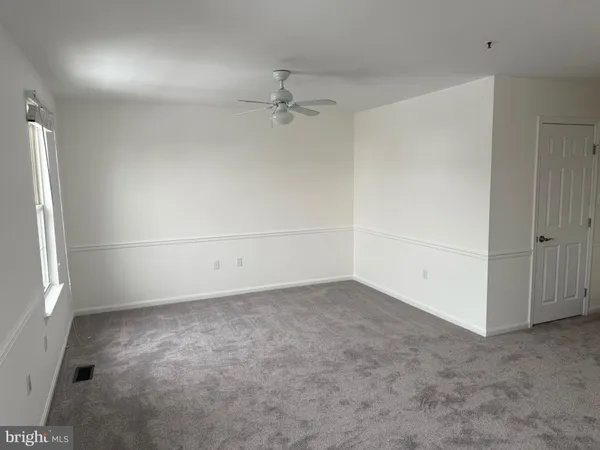 an empty room with closet