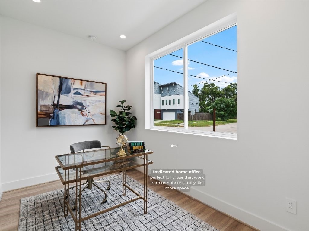 4436 Oats Street Houston, TX 77020 - Photo 4 of 37 a workspace with furniture and a window