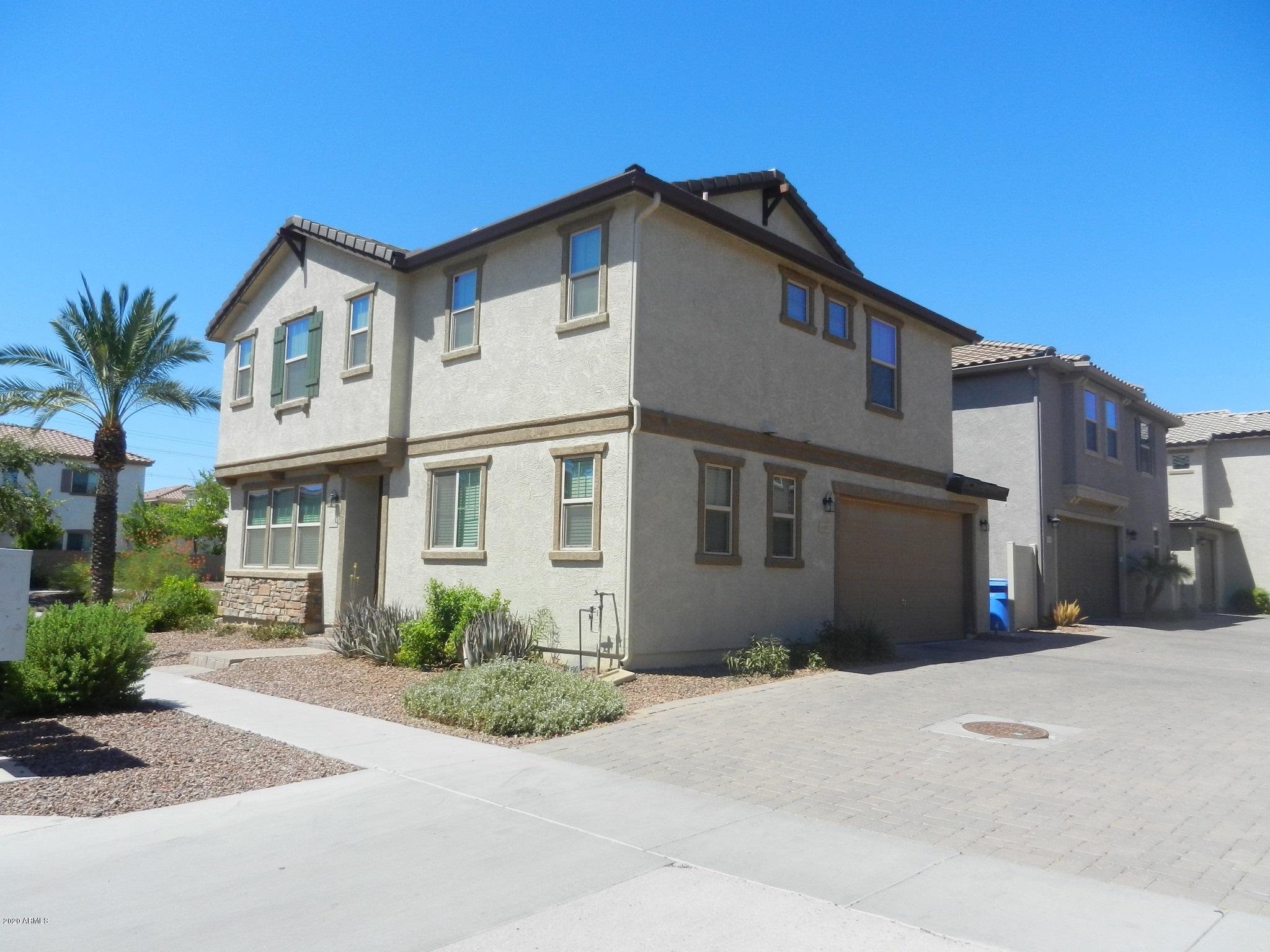 460 North Ranger Trail Gilbert, AZ 85234 - Photo 1 of 21 Front and garage