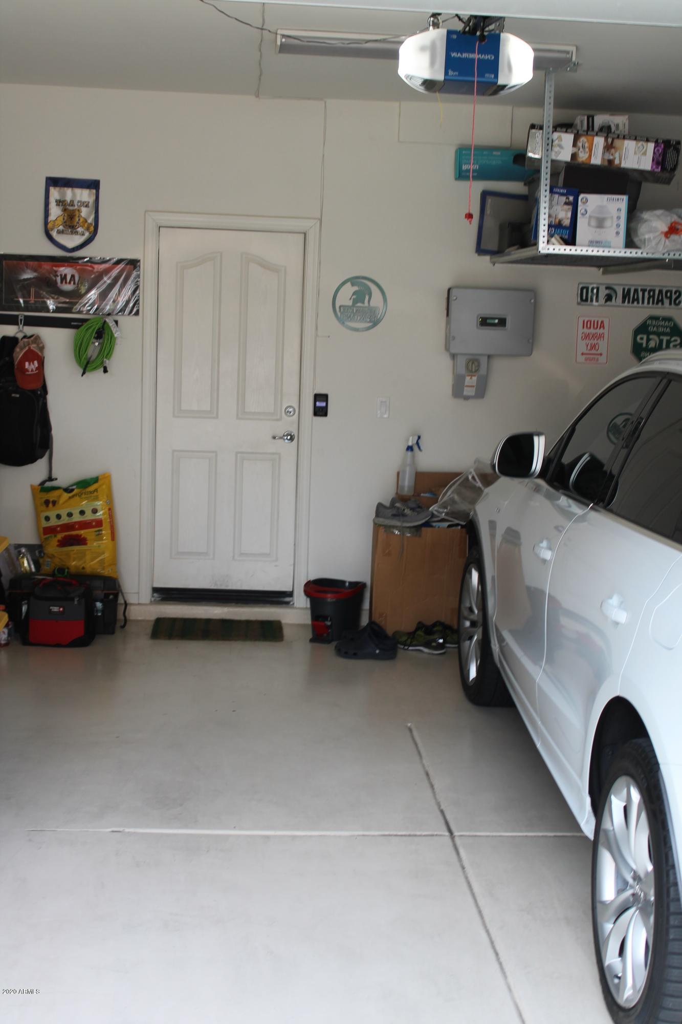 460 North Ranger Trail Gilbert, AZ 85234 - Photo 21 of 21 Garage epoxy floor and storage