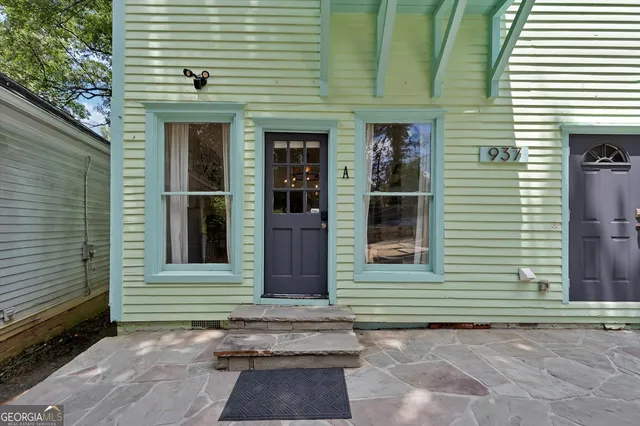 a view of a entrance of the house and window