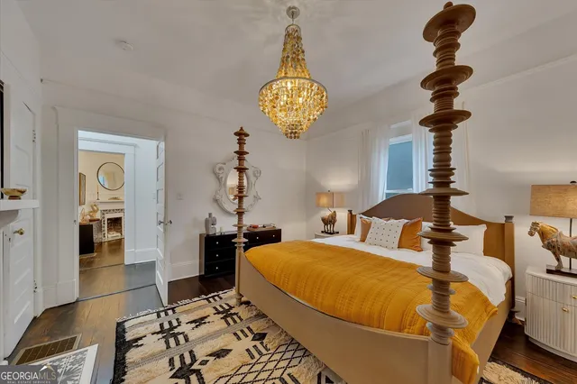 a bedroom with bed and window