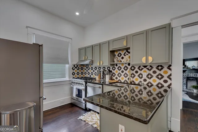 a room with wooden cabinets and table