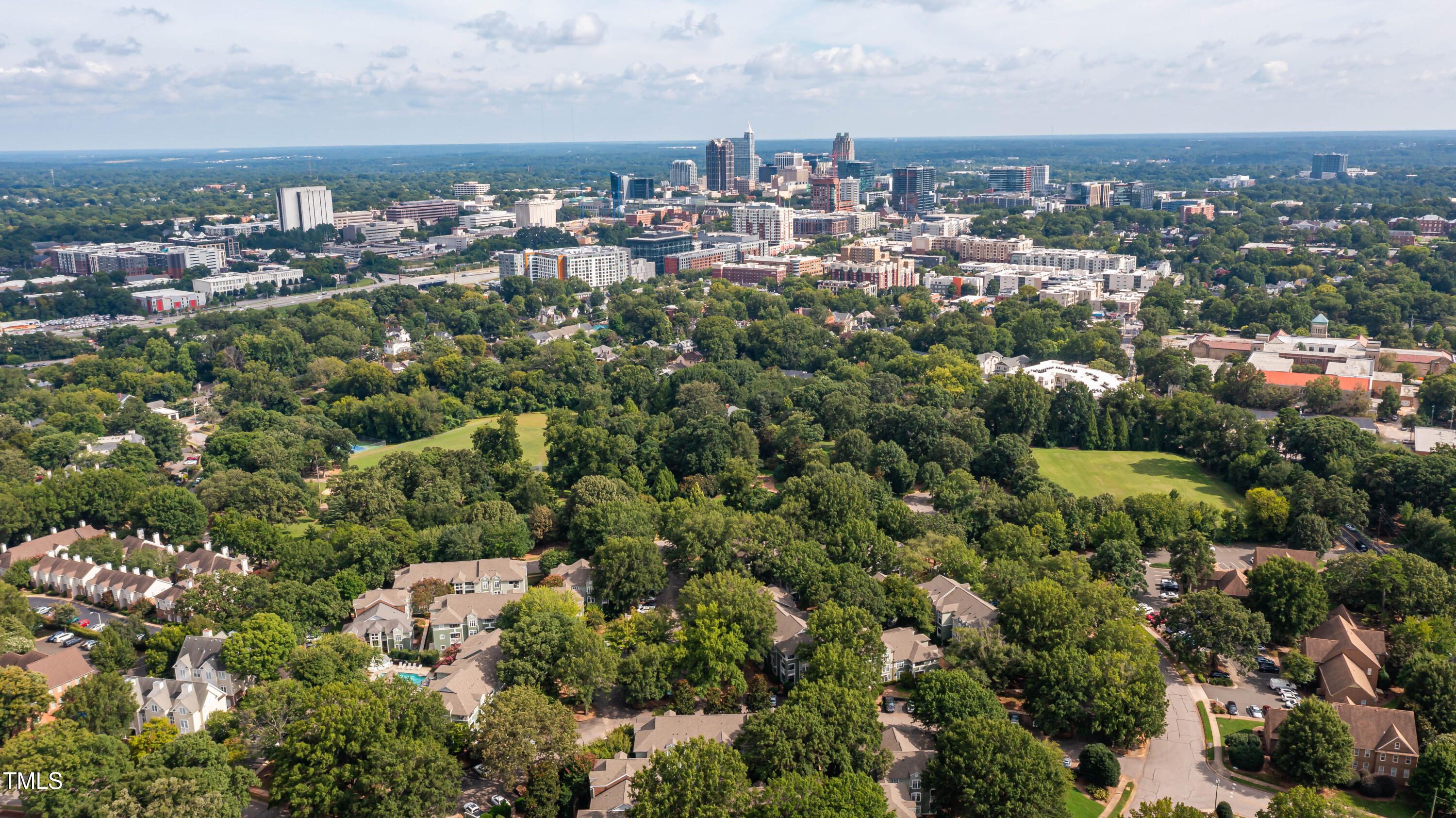 1211 Westview Lane, Unit 201 Raleigh, NC 27605 - Photo 28 of 40 an aerial view of a city with lots of residential buildings
