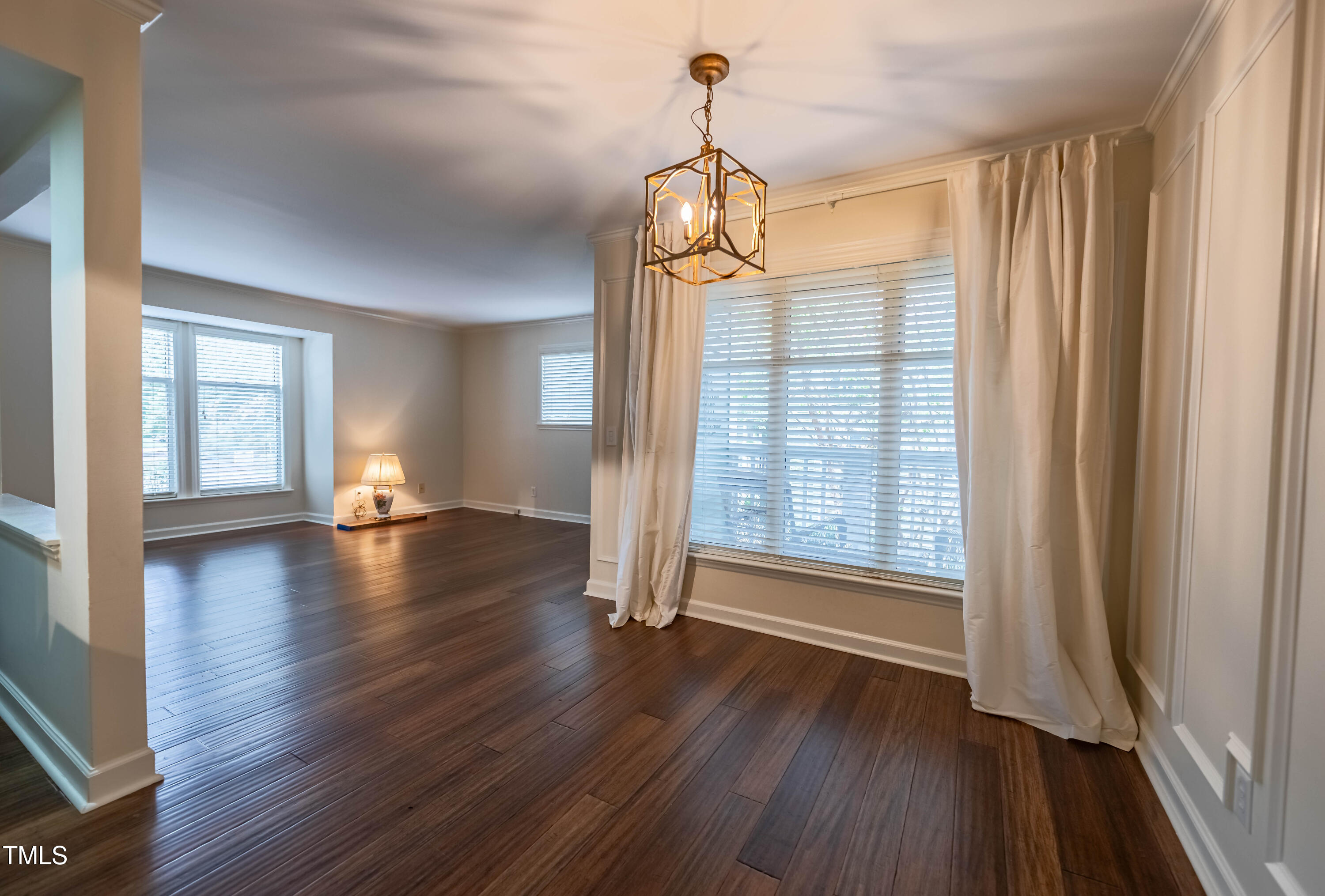 1211 Westview Lane, Unit 201 Raleigh, NC 27605 - Photo 9 of 40 a view of livingroom with hardwood floor and window