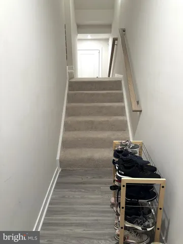 a view of entryway with wooden floor