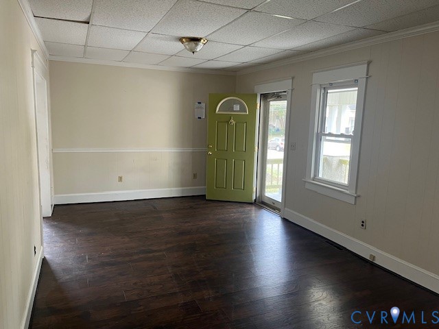 231 Cameron Avenue Colonial Heights, VA 23834 - Photo 2 of 9 an empty room with wooden floor and windows