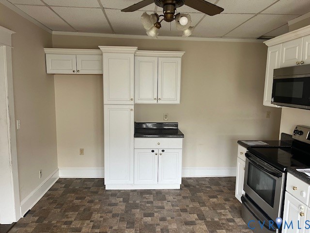 231 Cameron Avenue Colonial Heights, VA 23834 - Photo 5 of 9 a kitchen with a refrigerator and a stove top oven