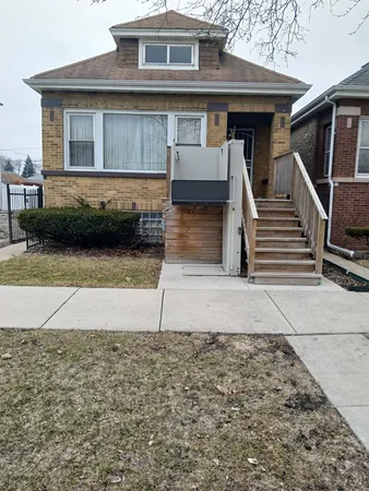 a front view of a house with garage