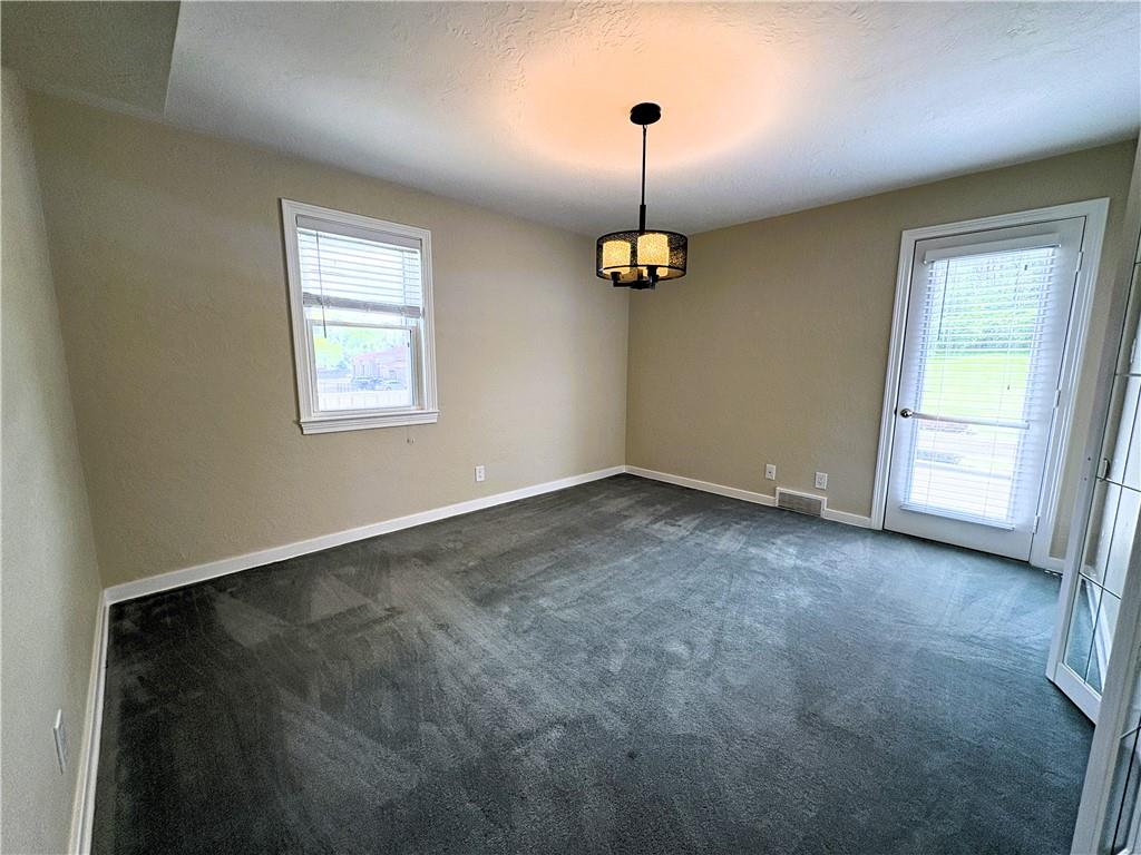 122 Browns Hill Road Valencia, PA 16059 - Photo 9 of 18 a view of empty room with windows
